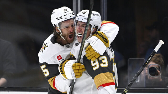 SALT LAKE CITY, UTAH - MAY 01: Mitch Marner #93 of the Vegas Golden Knights congratulated by Noah Hanifin #15 after scoring a goal against the Utah Mammoth during the second period in Game Six of the First Round of the 2026 Stanley Cup Playoffs at Delta Center on May 01, 2026 in Salt Lake City, Utah.