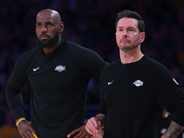 LOS ANGELES, CA - APRIL 18: LeBron James #23 of the Los Angeles Lakers and Head Coach JJ Redick of the Los Angeles Lakers looks on during the game against the Houston Rockets during Round One Game One of the 2026 NBA Playoffs on April 18, 2026 at Crypto.Com Arena in Los Angeles, California. NOTE TO USER: User expressly acknowledges and agrees that, by downloading and/or using this Photograph, user is consenting to the terms and conditions of the Getty Images License Agreement. Mandatory Copyright Notice: Copyright 2026 NBAE
