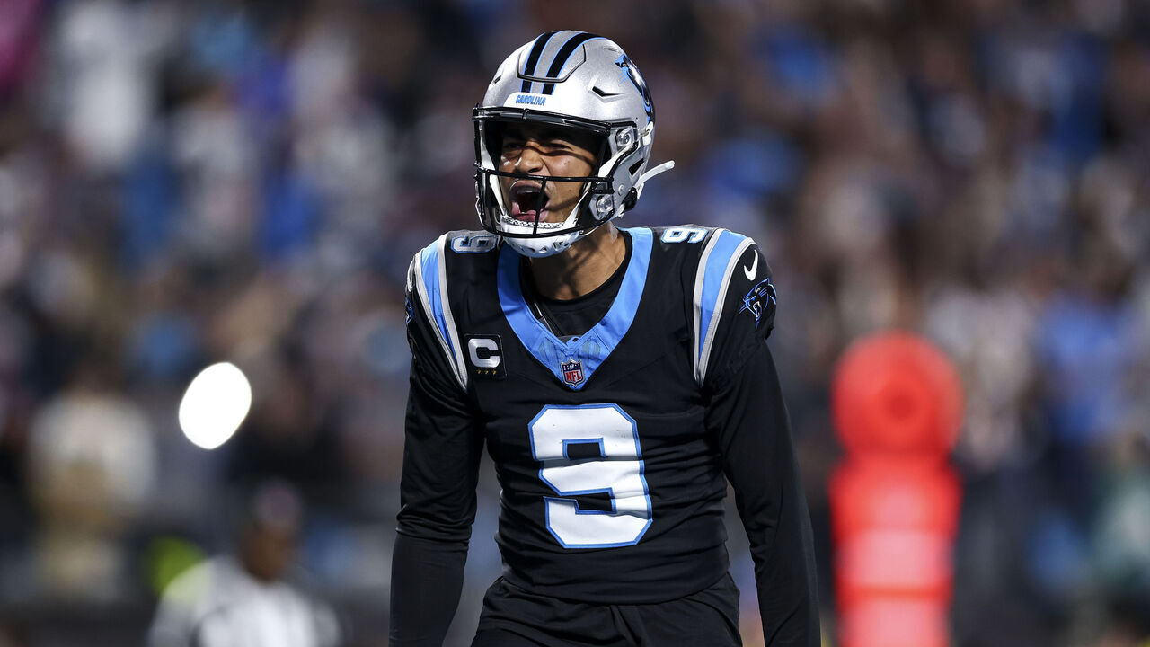 CHARLOTTE, NORTH CAROLINA - JANUARY 10: Bryce Young #9 of the Carolina Panthers celebrates after scoring a touchdown during an NFL wild card playoff football game against the Los Angeles Rams at Bank of America Stadium on January 10, 2026 in Charlotte, North Carolina.