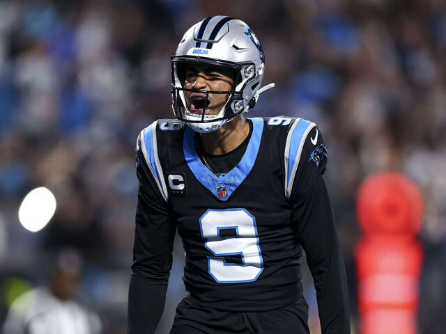 CHARLOTTE, NORTH CAROLINA - JANUARY 10: Bryce Young #9 of the Carolina Panthers celebrates after scoring a touchdown during an NFL wild card playoff football game against the Los Angeles Rams at Bank of America Stadium on January 10, 2026 in Charlotte, North Carolina.