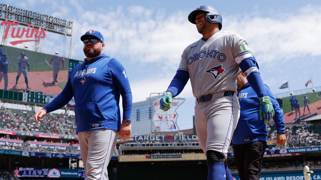 MINNEAPOLIS, MN - MAY 02: Toronto Blue Jays designated hitter George Springer (4) exits after being hit by a pitch during the third inning of the MLB game between Toronto Blue Jays and the Minnesota Twins on May 2nd, 2026, at Target Field in Minneapolis, MN.