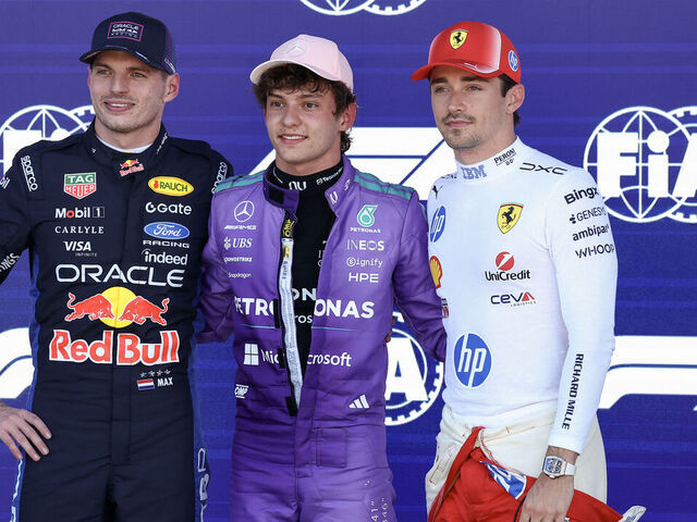Mercedes' Italian driver Kimi Antonelli (C), winner of the pole position, stands with Red Bull Racing's Dutch driver Max Verstappen (L), who finished second, and Ferrari's Monegasque driver Charles Leclerc (R), who finished third, after the qualifying session for the 2026 Miami Formula One Grand Prix at Miami International Autodrome in Miami Gardens, Florida, on May 2, 2026.