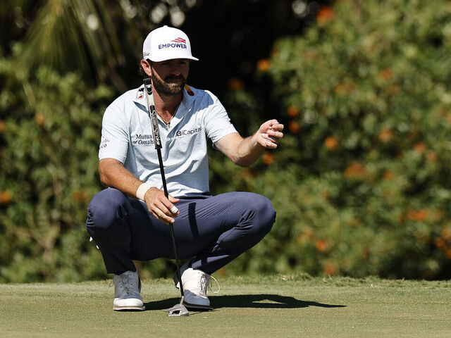 DORAL, FLORIDA - MAY 02: Cameron Young of the United States lines up a putt on the 12th green during the third round of the Cadillac Championship 2026 at Trump National Doral Miami on May 02, 2026 in Doral, Florida.