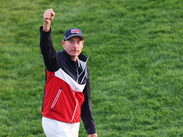 FARMINGDALE, NEW YORK - SEPTEMBER 27: Vice captain Jim Furyk of Team United States pumps up the crowd at the first hole grandstands during the Saturday morning foursomes matches of the 2025 Ryder Cup at Black Course at Bethpage State Park Golf Course on September 27, 2025 in Farmingdale, New York.