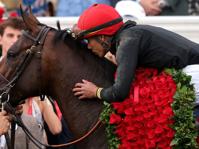 LOUISVILLE, KENTUCKY - MAY 02: Jockey Jose Ortiz of Golden Tempo celebrates with the Garland of Roses after winning the 152nd running of the Kentucky Derby at Churchill Downs on May 02, 2026 in Louisville, Kentucky.