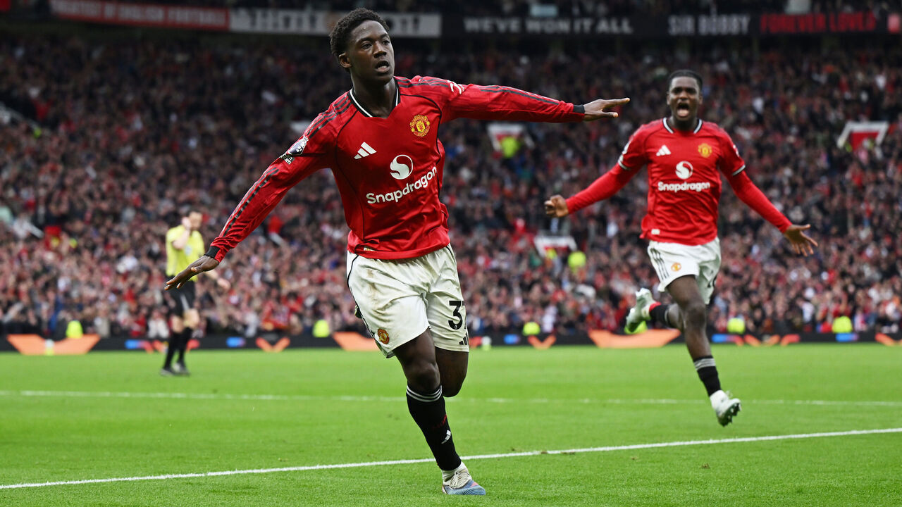 MANCHESTER, ENGLAND - MAY 03: Kobbie Mainoo of Manchester United celebrates scoring his team's third goal during the Premier League match between Manchester United and Liverpool at Old Trafford on May 03, 2026 in Manchester, England.