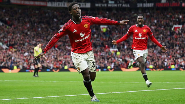 MANCHESTER, ENGLAND - MAY 03: Kobbie Mainoo of Manchester United celebrates scoring his team's third goal during the Premier League match between Manchester United and Liverpool at Old Trafford on May 03, 2026 in Manchester, England.