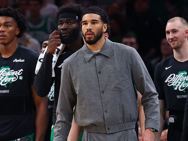 BOSTON, MASSACHUSETTS - MAY 02: Jayson Tatum #0 of the Boston Celtics watches from the bench during the third quarter of a game against the Philadelphia 76ers in Game Seven of the First Round of the NBA Eastern Conference Playoffs at TD Garden on May 02, 2026 in Boston, Massachusetts.