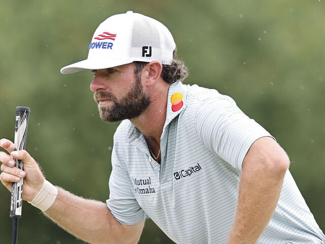 DORAL, FLORIDA - MAY 03: Cameron Young of the United States lines up a putt on the 12th green during the final round of the Cadillac Championship 2026 at Trump National Doral Miami on May 03, 2026 in Doral, Florida.