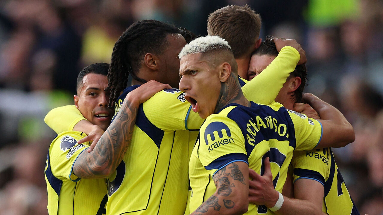 Tottenham Hotspur's English midfielder #22 Conor Gallagher (R) celebrates scoring the team's first goal with teammates during the English Premier League football match between Aston Villa and Tottenham Hotspur at Villa Park in Birmingham, central England on May 3, 2026. / RESTRICTED TO EDITORIAL USE. No use with unauthorized audio, video, data, fixture lists, club/league logos or 'live' services. Online in-match use limited to 120 images. An additional 40 images may be used in extra time. No video emulation. Social media in-match use limited to 120 images. An additional 40 images may be used in extra time. No use in betting publications, games or single club/league/player publications. /