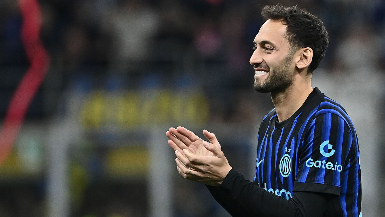 MILAN, ITALY - MAY 3: Inter Milan's player Hakan Calhanoglu celebrates his team's 21st Scudetto victory by winning the Serie A championship the at the end of the Italian Serie A football match between Inter and Parma at the Meazza San Siro stadium in Milan, Italy, on May 3, 2026.