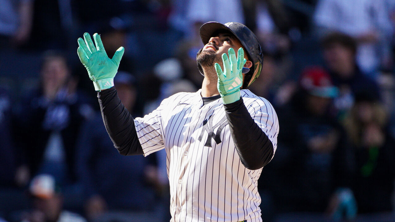 NEW YORK, NEW YORK - MAY 03: Jasson Domínguez #24 of the New York Yankees gestures after crossing home plate off of his eighth inning two-run home run against the Baltimore Orioles at Yankee Stadium on May 03, 2026 in New York City.