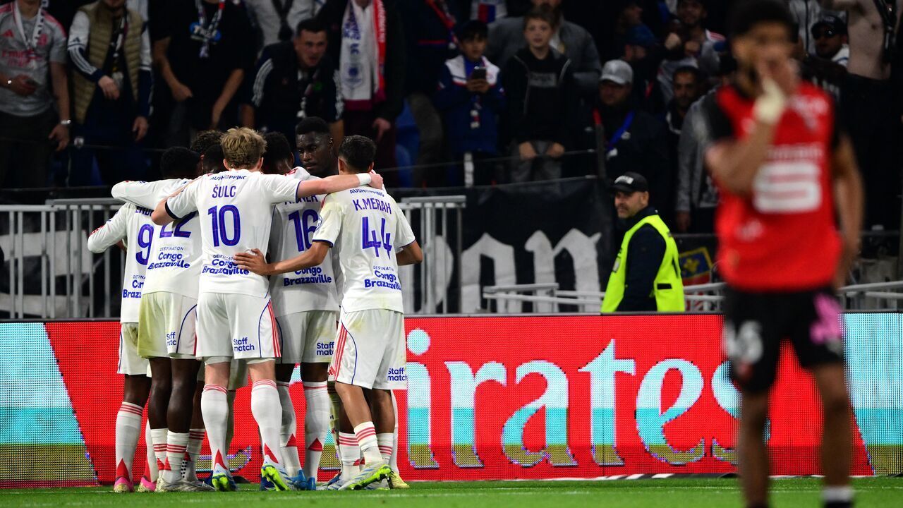 Lyon's players celebrate after scoring a goal during the French L1 football match between Olympique Lyonnais and Rennes at the Groupama Stadium in Decines-Charpieu, central-eastern France, on May 3, 2026.