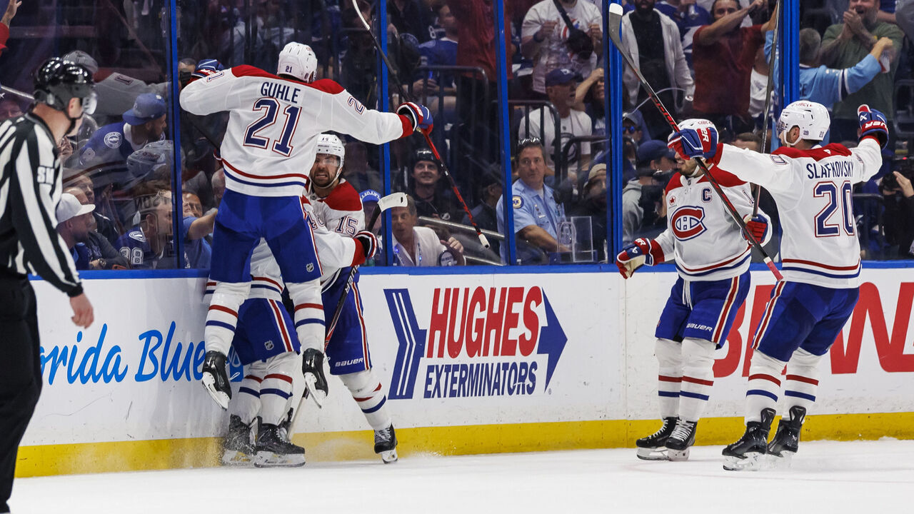 TAMPA, FL - MAY 3: Alex Newhook #15 of the Montreal Canadiens celebrates a goal with teammates against the Tampa Bay Lightning in Game Seven of the First Round of the 2026 Stanley Cup Playoffs at Benchmark International Arena on May 3, 2026 in Tampa, Florida.