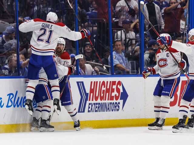 TAMPA, FL - MAY 3: Alex Newhook #15 of the Montreal Canadiens celebrates a goal with teammates against the Tampa Bay Lightning in Game Seven of the First Round of the 2026 Stanley Cup Playoffs at Benchmark International Arena on May 3, 2026 in Tampa, Florida.