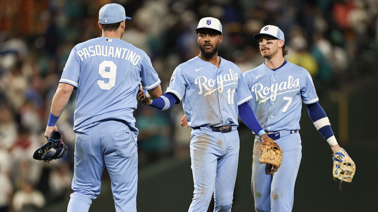 SEATTLE, WASHINGTON - MAY 02: Maikel Garcia #11 of the Kansas City Royals high fives Vinnie Pasquantino #9 of the Kansas City Royals after beating the Seattle Mariners in the tenth inning 3-2 at T-Mobile Park on May 02, 2026 in Seattle, Washington.