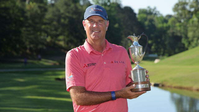 BIRMINGHAM, ALABAMA - MAY 03: Stewart Cink of the United States pose for a photograph with the trophy after winning the Regions Tradition 2026 at Greystone Golf and Country Club on May 03, 2026 in Birmingham, Alabama.