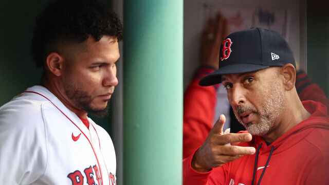 BOSTON, MA - APRIL 5: Manager Alex Cora #13 of the Boston Red Sox talks with Willson Contreras #40 during the game against the San Diego Padres at Fenway Park on April 5, 2026 in Boston, Massachusetts.