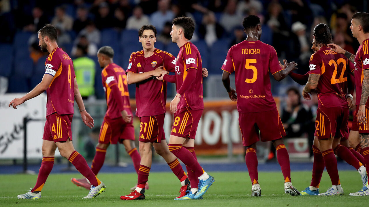 ROME, ITALY - MAY 04: Niccolo Pisilli of AS Roma celebrates scoring his team's fourth goal with teammate Matias Soule during the Serie A match between AS Roma and ACF Fiorentina at Stadio Olimpico on May 04, 2026 in Rome, Italy.