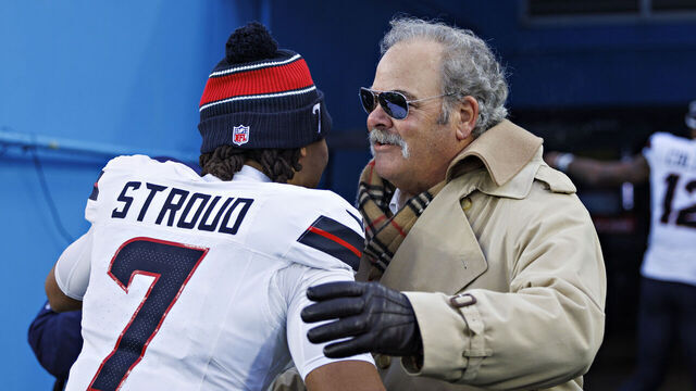NASHVILLE, TENNESSEE - JANUARY 5: C.J. Stroud #7 hugs Owner Cal McNair of the Houston Texans after a game against the Tennessee Titans at Nissan Stadium on January 5, 2025 in Nashville, Tennessee. The Texans defeated the Titans 23-14.