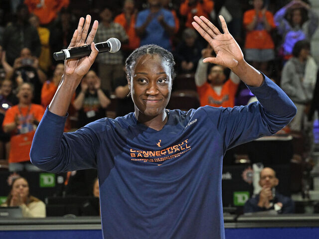 UNCASVILLE, CONNECTICUT - SEPTEMBER 10: Tina Charles #31 of the Connecticut Sun waves to the fans after giving a thank you speech following the Sun loss to the the Atlanta Dream in the second half at Mohegan Sun Arena on September 10, 2025 in Uncasville, Connecticut.