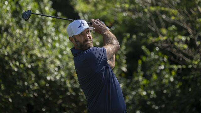 Masters champion Dustin Johnson of the United States plays a stroke from the No. 2 tee during the final round of the Masters at Augusta National Golf Club, Sunday, April 12, 2026.