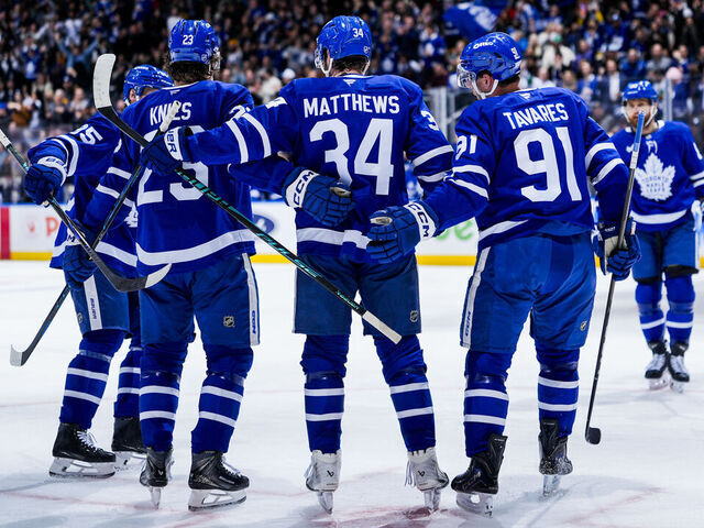 TORONTO, CANADA - MARCH 12: Auston Matthews #34 of the Toronto Maple Leafs celebrates after scoring a goal against the Anaheim Ducks with teammates Matthew Knies #23 and John Tavares #91 during the second period at the Scotiabank Arena on March 12, 2026 in Toronto, Ontario, Canada.