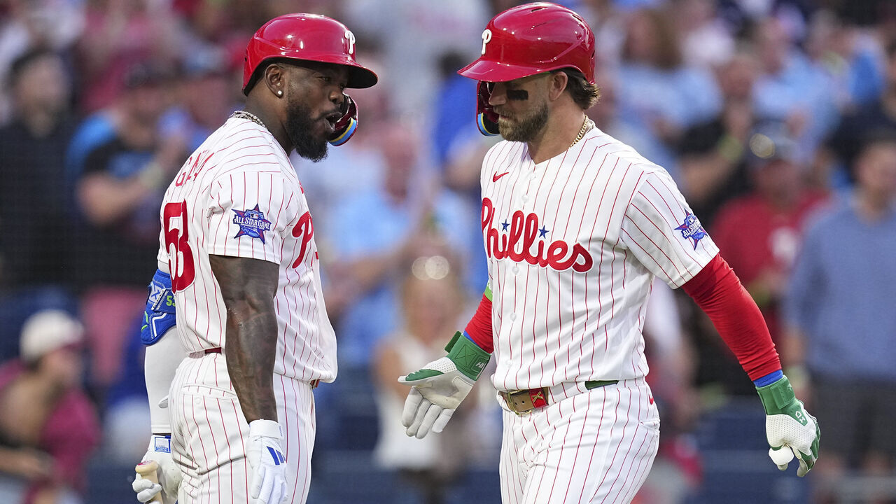 PHILADELPHIA, PENNSYLVANIA - MAY 5: Bryce Harper #3 (R) of the Philadelphia Phillies celebrates his solo home run with Adolis García #53 in the bottom of the third inning against the Athletics at Citizens Bank Park on May 5, 2026 in Philadelphia, Pennsylvania.