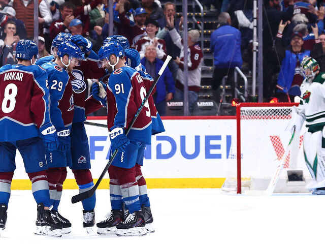 DENVER, COLORADO - MAY 05: Nathan MacKinnon #29 of the Colorado Avalanche congratulated by teammates after scoring a goal against the Minnesota Wild during the third period in Game Two of the Second Round of the 2026 Stanley Cup Playoffs at Ball Arena on May 05, 2026 in Denver, Colorado.
