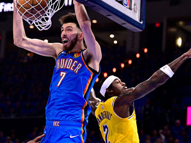 OKLAHOMA CITY, OKLAHOMA - MAY 05: Chet Holmgren #7 of the Oklahoma City Thunder dunks against Rui Hachimura #28 and Jarred Vanderbilt #2 of the Los Angeles Lakers during the second quarter in Game One of the Second Round of the NBA Western Conference Playoffs at Paycom Center on May 05, 2026 in Oklahoma City, Oklahoma.
