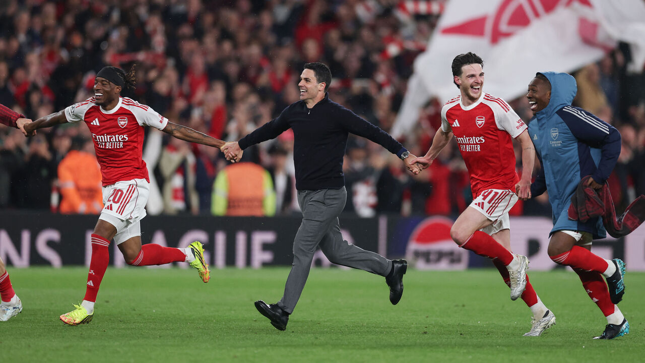LONDON, ENGLAND - MAY 05: Noni Madueke of Arsenal, Mikel Arteta, Manager of Arsenal and Declan Rice of Arsenal celebrate after winning the UEFA Champions League 2025/26 Semi Final Second Leg match between Arsenal FC and Atletico de Madrid at Arsenal Stadium on May 05, 2026 in London, England.
