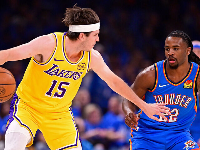 OKLAHOMA CITY, OKLAHOMA - MAY 05: Cason Wallace #22 of the Oklahoma City Thunder defends Austin Reaves #15 of the Los Angeles Lakers during the first quarter in Game One of the Second Round of the NBA Western Conference Playoffs at Paycom Center on May 05, 2026 in Oklahoma City, Oklahoma.