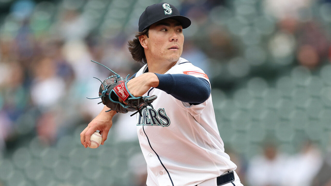 SEATTLE, WASHINGTON - MAY 06: Bryan Woo #22 of the Seattle Mariners pitches during the first inning against the Atlanta Braves at T-Mobile Park on May 06, 2026 in Seattle, Washington.