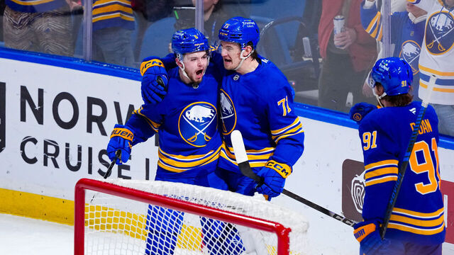 BUFFALO, NEW YORK - MAY 06: Ryan McLeod #71 celebrates with Zach Benson #6 and Josh Doan #91 of the Buffalo Sabres after scoring his team's second goal against the Montreal Canadiens during the first period in Game One of the Second Round of the 2026 Stanley Cup Playoffs at KeyBank Center on May 06, 2026 in Buffalo, New York.