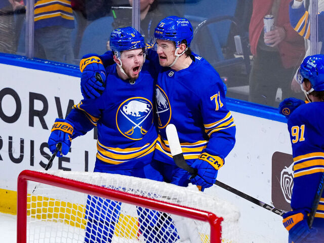 BUFFALO, NEW YORK - MAY 06: Ryan McLeod #71 celebrates with Zach Benson #6 and Josh Doan #91 of the Buffalo Sabres after scoring his team's second goal against the Montreal Canadiens during the first period in Game One of the Second Round of the 2026 Stanley Cup Playoffs at KeyBank Center on May 06, 2026 in Buffalo, New York.