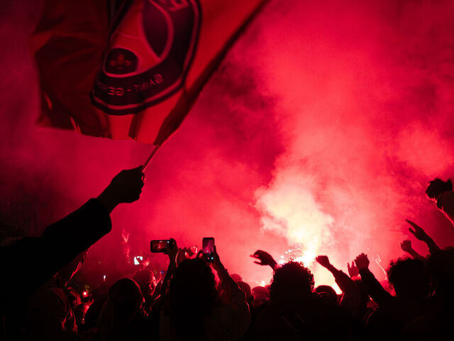 Paris Saint-Germain supporters celebrate in Place de la Republique, Paris, France, on May 6, following the club's victory over Bayern Munich in the semifinal, securing their qualification for the UEFA Champions League final.