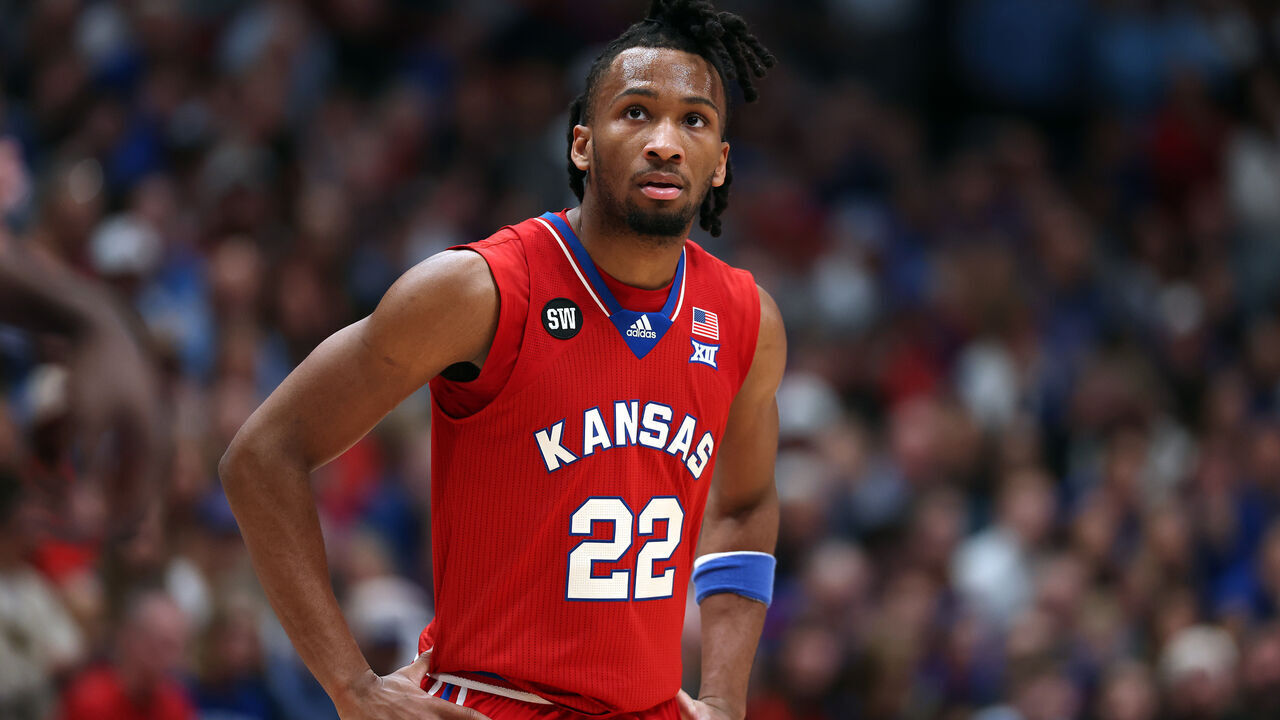 LAWRENCE, KANSAS - MARCH 07: Darryn Peterson #22 of the Kansas Jayhawks watches during a timeout in the game against the Kansas State Wildcats at Allen Fieldhouse on March 07, 2026 in Lawrence, Kansas.