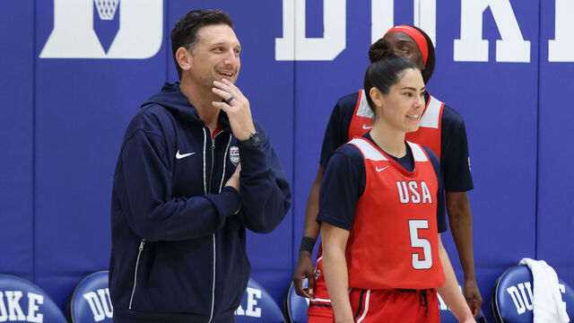 CHARLOTTE, NC - DECEMBER 12: Head Coach Nate Tibbetts and Kelsey Plum #5 smiles during the United States Women's Basketball Team Training Camp on December 12, 2025 at Duke University in Durham, North Carolina. Mandatory Copyright Notice: Copyright 2025 NBAE