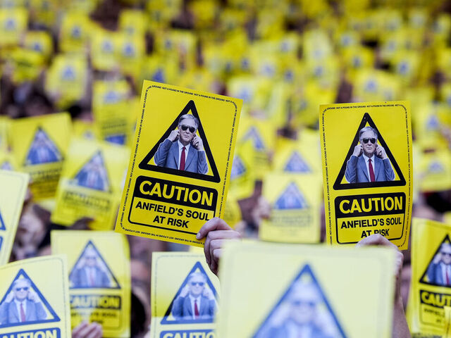 Liverpool fans holding Show FSG the Yellow Card flyers, in protest against the planned ticket price increases, pictured during the Premier League match between Liverpool and Crystal Palace at Anfield, Liverpool. Picture date: Saturday April 25, 2026.