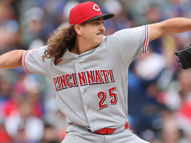 CHICAGO, ILLINOIS - MAY 07: Rhett Lowder #25 of the Cincinnati Reds delivers a pitch against the Chicago Cubs during the fourth inning at Wrigley Field on May 07, 2026 in Chicago, Illinois.