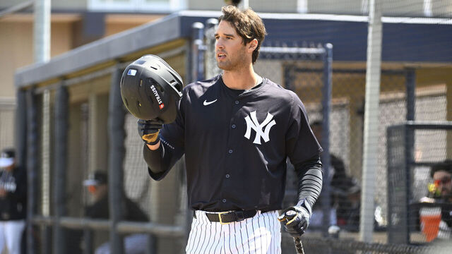 TAMPA, FLORIDA - MARCH 17, 2026: Spencer Jones #68 of the New York Yankees puts on his helmet prior to an at bat during an intrasquad scrimmage game on Billy Martin Field 1 at the Himes Complex on March 17, 2026 in Tampa, Florida.