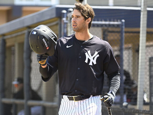 TAMPA, FLORIDA - MARCH 17, 2026: Spencer Jones #68 of the New York Yankees puts on his helmet prior to an at bat during an intrasquad scrimmage game on Billy Martin Field 1 at the Himes Complex on March 17, 2026 in Tampa, Florida.