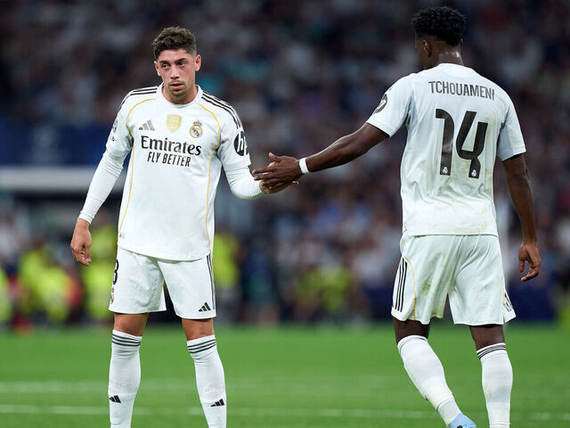 MADRID, SPAIN - SEPTEMBER 16: Federico Valverde and Aurelien Tchouameni of Real Madrid shake hands during the UEFA Champions League 2025/26 League Phase MD1 match between Real Madrid C.F. and Olympique de Marseille at Estadio Santiago Bernabeu on September 16, 2025 in Madrid, Spain.