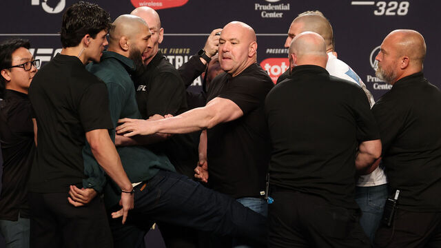 NEWARK, NEW JERSEY - MAY 07: (L-R) Khamzat Chimaev of Russia kicks Sean Strickland during a face off on stage at the UFC 328 press conference at Prudential Center on May 07, 2026 in Newark, New Jersey.