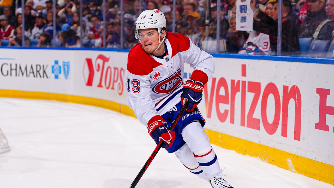 BUFFALO, NEW YORK - MAY 06: Cole Caufield #13 of the Montreal Canadiens handles the puck against the Buffalo Sabres during the first period in Game One of the Second Round of the 2026 Stanley Cup Playoffs at KeyBank Center on May 06, 2026 in Buffalo, New York.