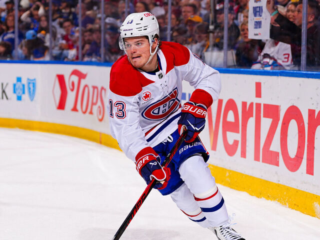 BUFFALO, NEW YORK - MAY 06: Cole Caufield #13 of the Montreal Canadiens handles the puck against the Buffalo Sabres during the first period in Game One of the Second Round of the 2026 Stanley Cup Playoffs at KeyBank Center on May 06, 2026 in Buffalo, New York.