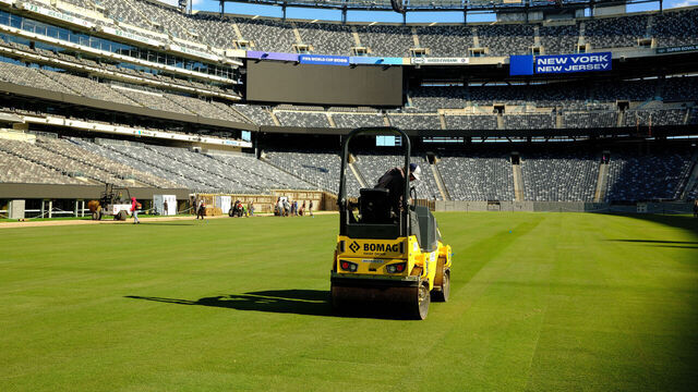 Workers install the pitch at New York New Jersey Stadium (temporarily renamed from MetLife stadium) ahead of the 2026 FIFA World Cup, in East Rutherford, New Jersey on May 7, 2026.