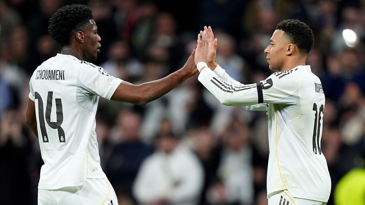 MADRID, SPAIN - JANUARY 20: Kylian Mbappe of Real Madrid celebrates scoring his team's second goal with Aurelien Tchouameni during the UEFA Champions League 2025/26 League Phase MD7 match between Real Madrid C.F. and AS Monaco at Estadio Santiago Bernabeu on January 20, 2026 in Madrid, Spain.