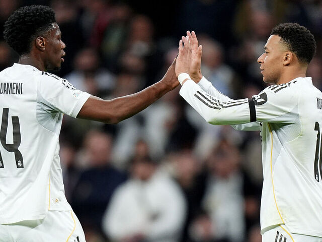 MADRID, SPAIN - JANUARY 20: Kylian Mbappe of Real Madrid celebrates scoring his team's second goal with Aurelien Tchouameni during the UEFA Champions League 2025/26 League Phase MD7 match between Real Madrid C.F. and AS Monaco at Estadio Santiago Bernabeu on January 20, 2026 in Madrid, Spain.