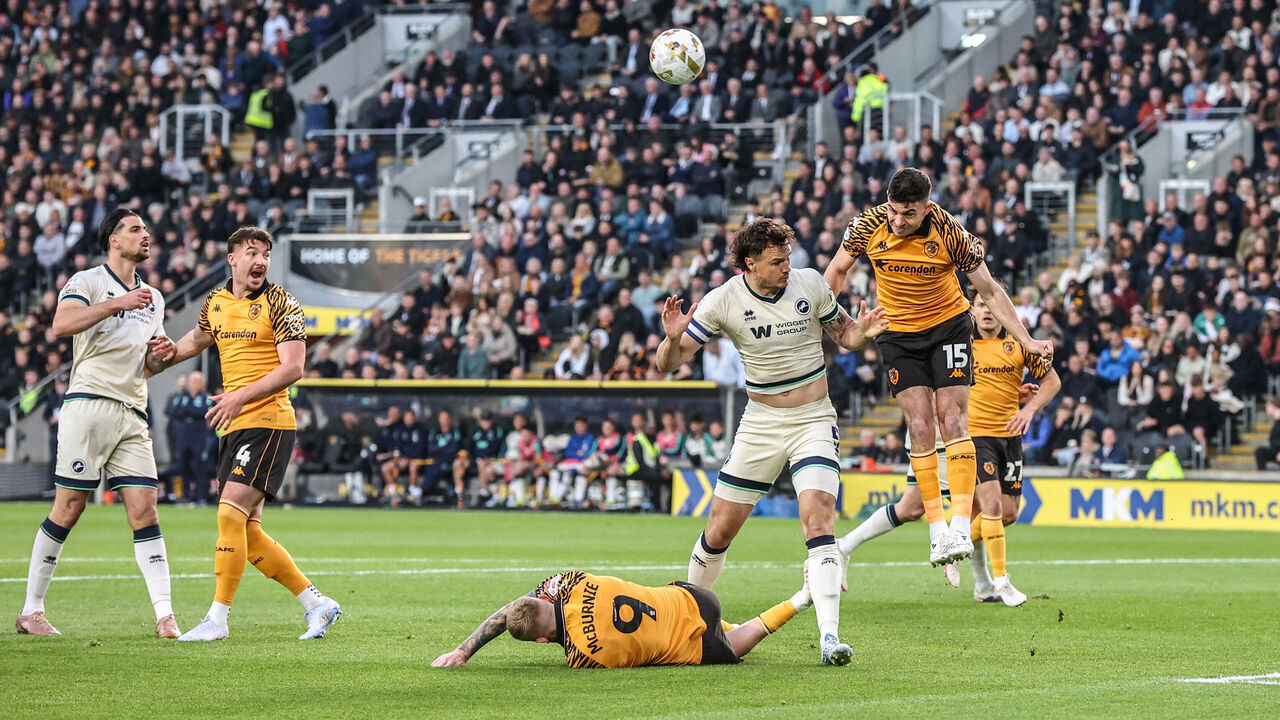 John Egan of Hull City heads the ball clear during the Sky Bet Championship Play-Offs Semi-Final first leg between Hull City and Millwall at MKM Stadium in Hull, United Kingdom, on May 8, 2026.